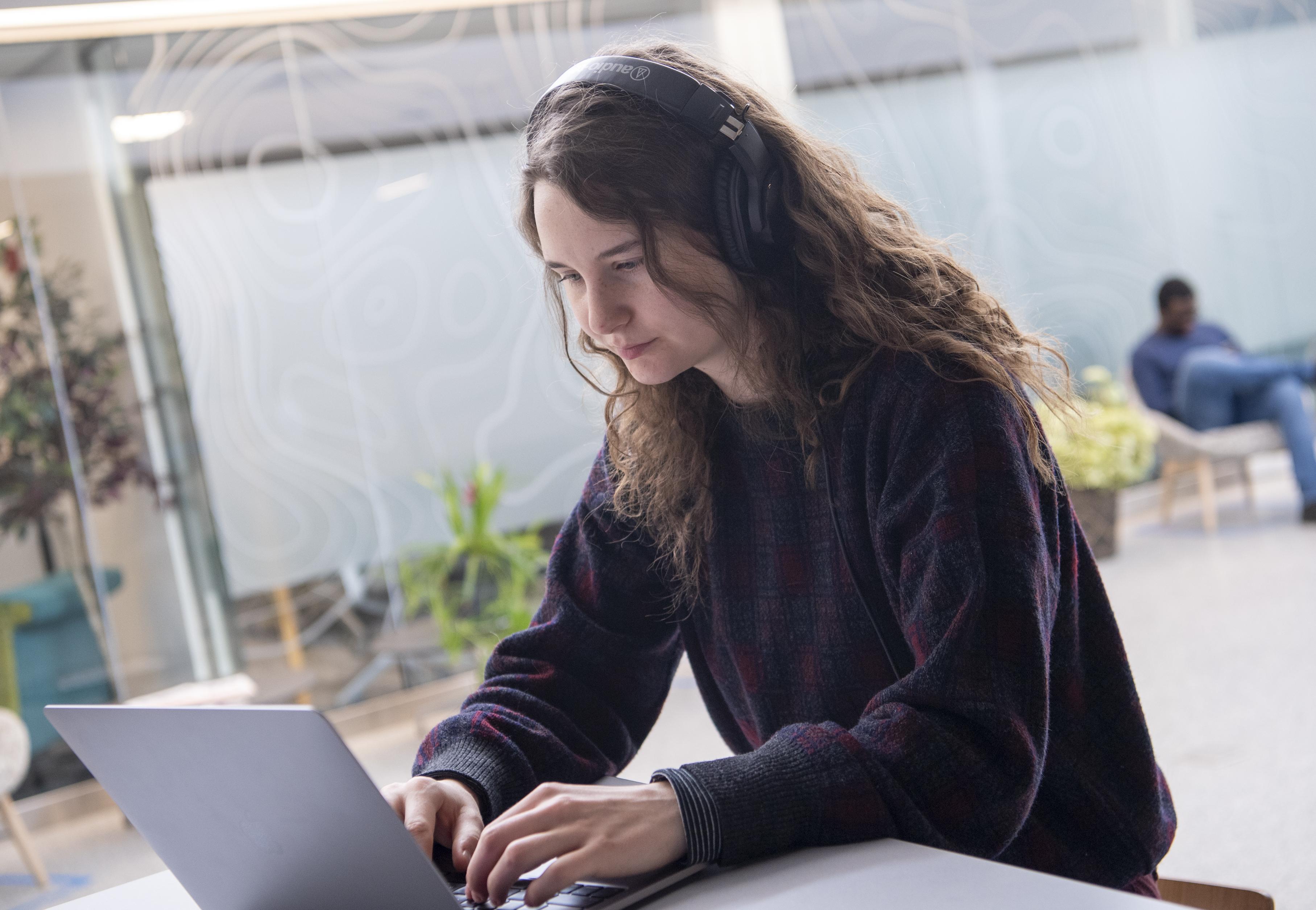 Student working on a laptop